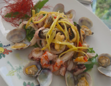 Ristorante L'Agave Capri signature dishes Seafood Scialatielli
Fried Calamari
Lemon Cake